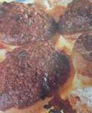 Melocotones con relleno de chocolate y amaretti