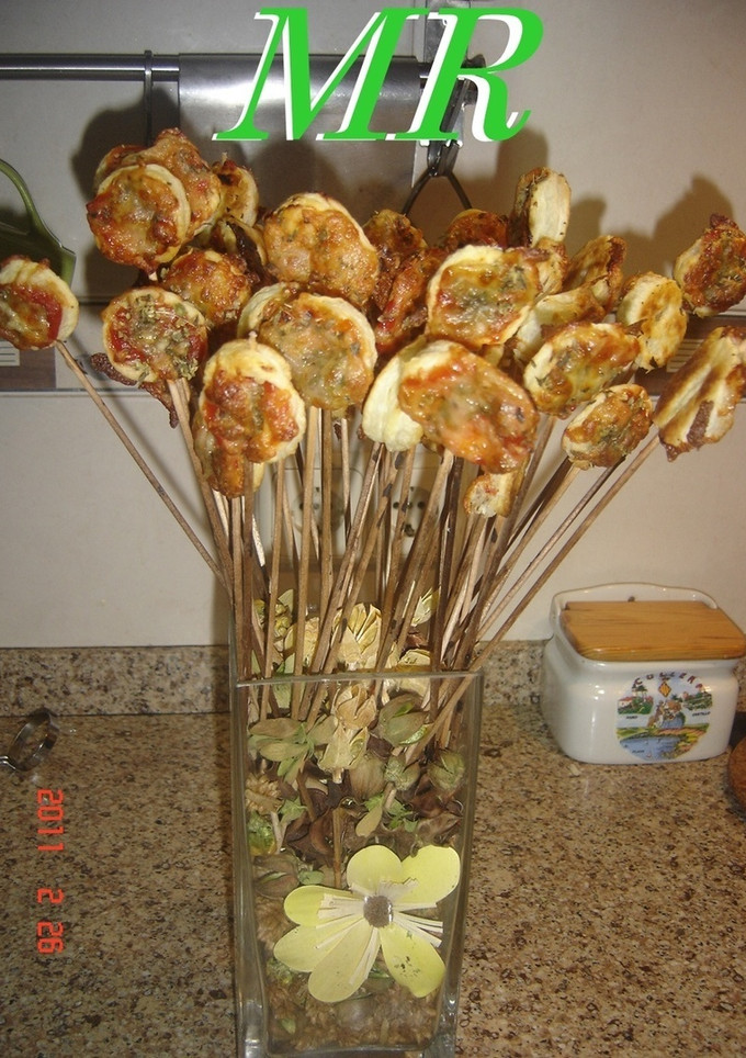 Una foto de Piruletas de pizzas hojaldradas