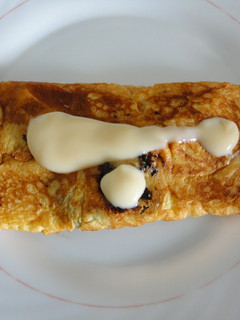 Una foto de Tortilla con natillas
