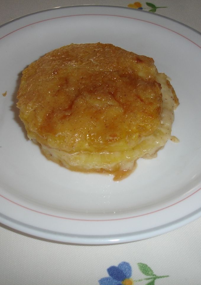 Una foto de Piña natural con crema gratinada