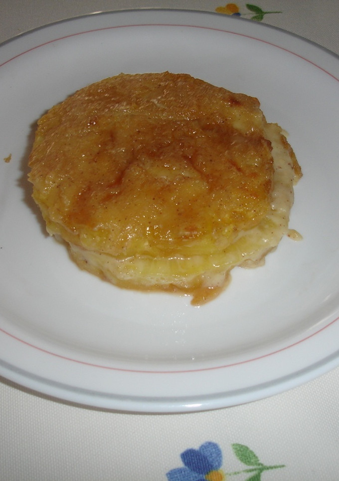 Una foto de Piña natural con crema gratinada