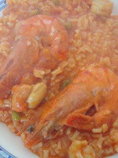 Una foto de Arroz caldoso con vieiras y langostinos