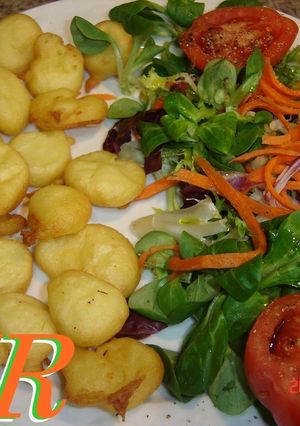 Una foto de Buñuelos de viento de bacalao