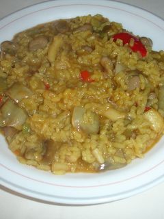 Una foto de Arroz meloso de la huerta y calamares