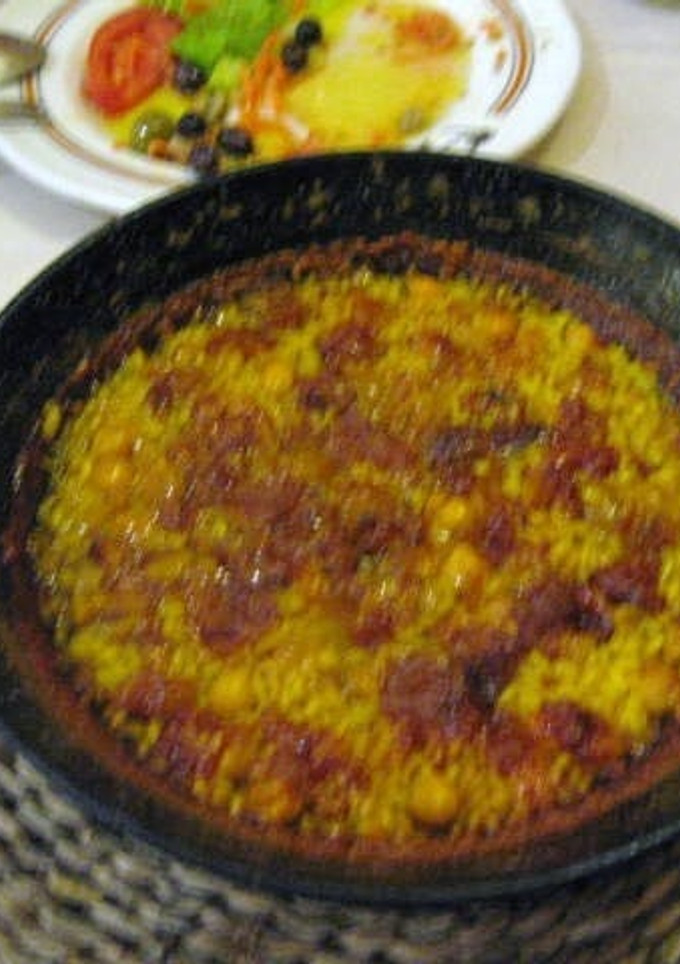 Una foto de Arroz con pata