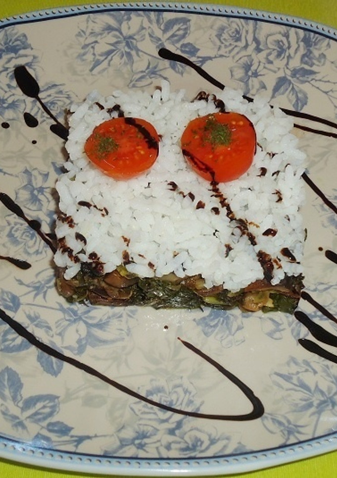 Una foto de Tartar de acelgas setas y arroz