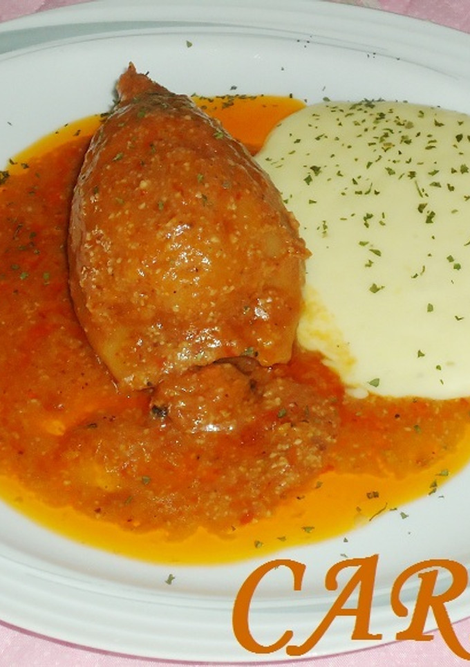 Una foto de Calamares rellenos de rape y langostinos