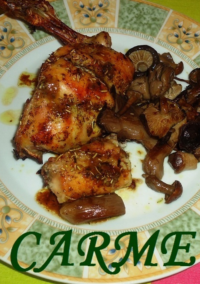 Una foto de Conejo asado con setas al cava