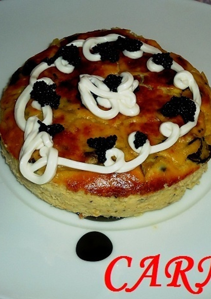 Una foto de Pastel de col, setas y jamón serrano