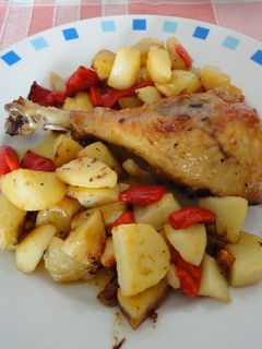 Una foto de Muslos de pollos a la cerveza con patatas