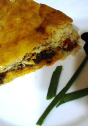 Una foto de Empanada de morcilla y pimientos