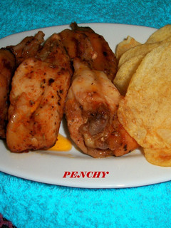 Una foto de Pollo al horno con hierbas y especias