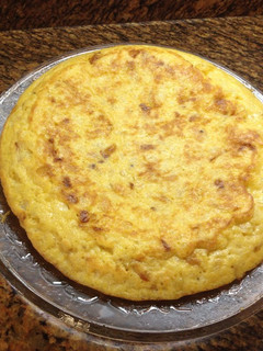 Una foto de Tortilla de patatas con cebolla y leche