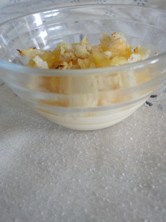 Una foto de Crumble de crema y manzana
