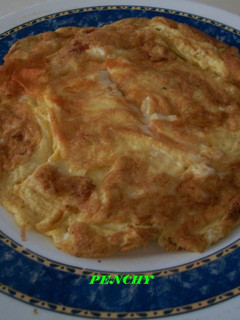 Una foto de Tortilla de queso de oveja curado