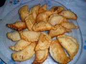 Una foto de empanadas de choclo y queso