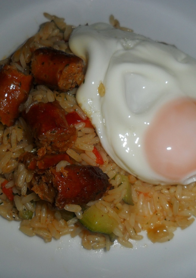 Una foto de Arroz a la griega con huevo frito