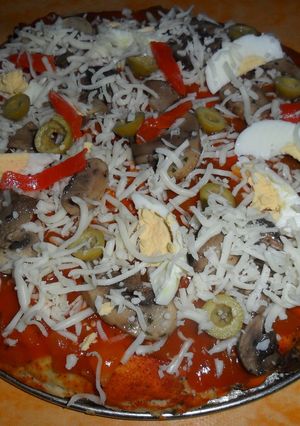 Una foto de Pizza con champiñones
