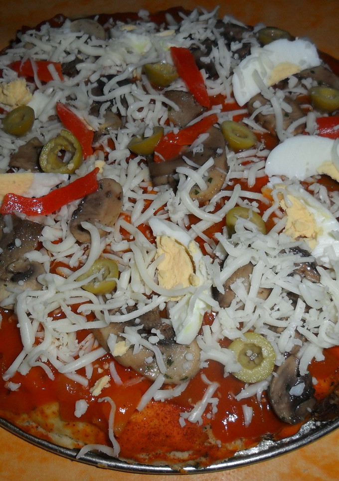 Una foto de Pizza con champiñones