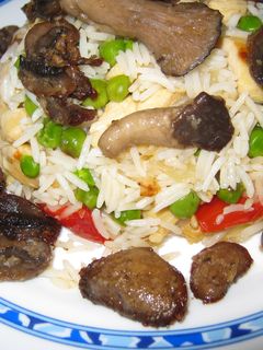 Una foto de Arroz con pollo y setas