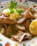 Conejo con champiñones y patatas