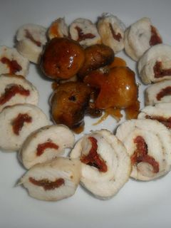 Una foto de Rollitos de pollo con champiñones acaramelados