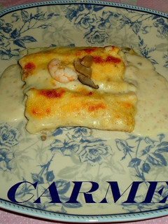 Una foto de Canelones de setas y langostinos