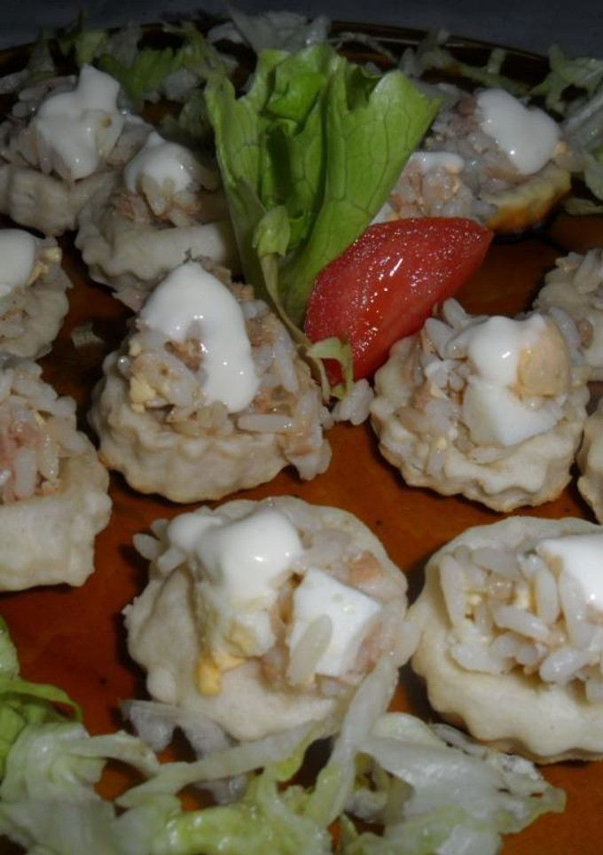 Una foto de Bocaditos hojaldrados de arroz y atún