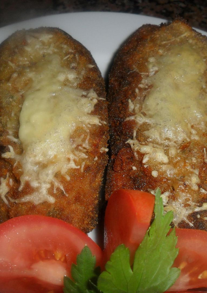 Una foto de Berenjenas rellenas, rebozadas, fritas y horneadas