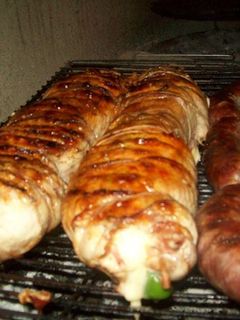 Una foto de Asado a la parrilla de matambre de vaca enlomado