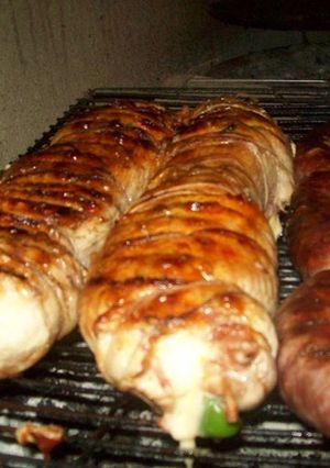 Una foto de Asado a la parrilla de matambre de vaca enlomado