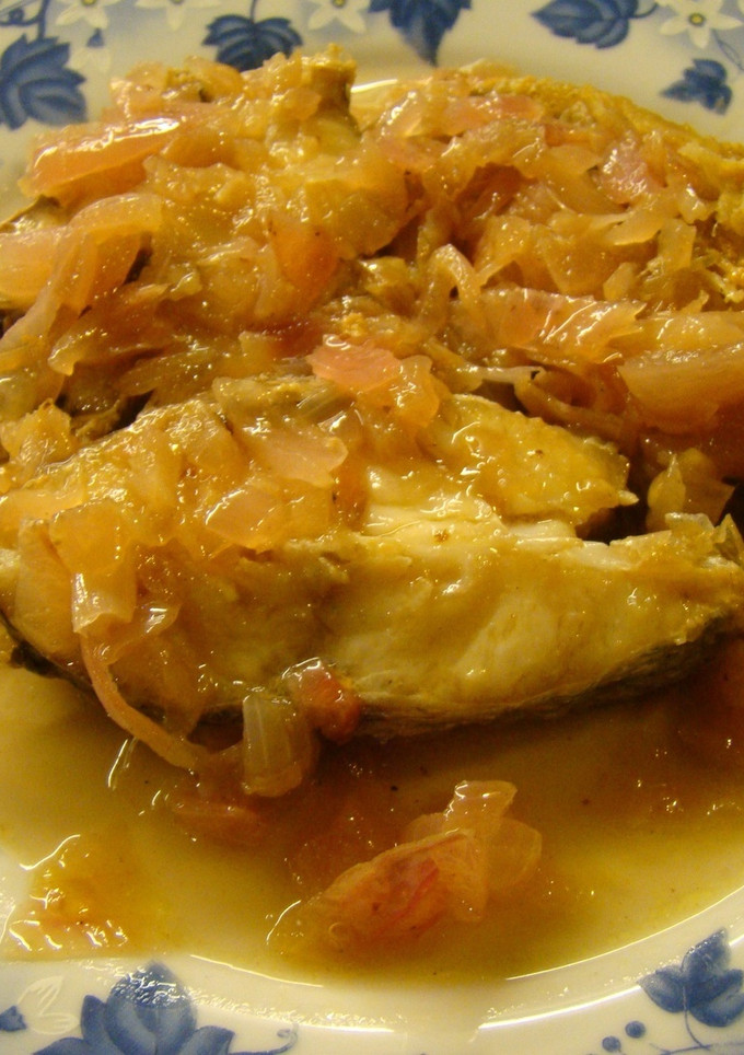 Una foto de Besugo encebollado