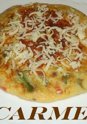Una foto de Tortilla de salteado de verduras y queso