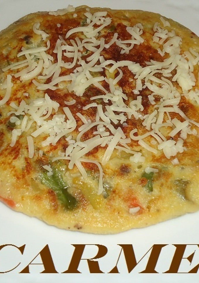 Una foto de Tortilla de salteado de verduras y queso