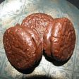 Alfajorcitos de café con dulce de leche y chocolate