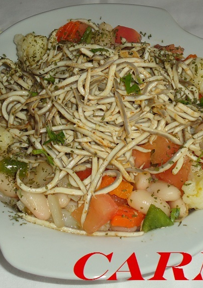 Una foto de Ensalada de alubias y anguriñas