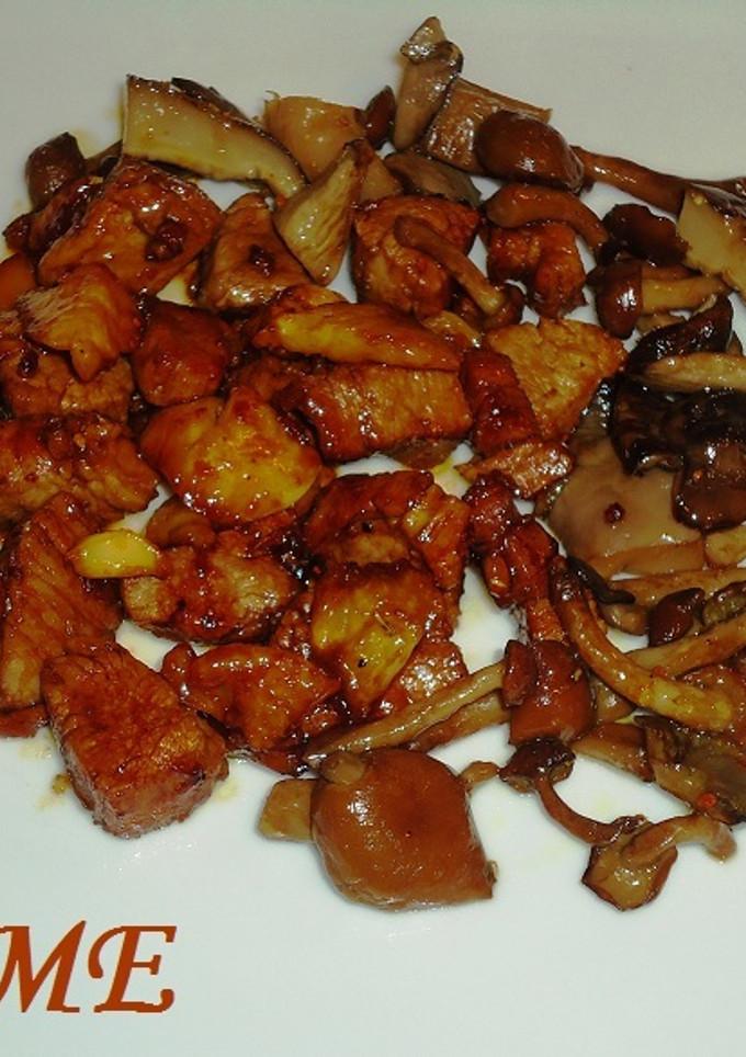 Una foto de Solomillo de cerdo agridulce con setas