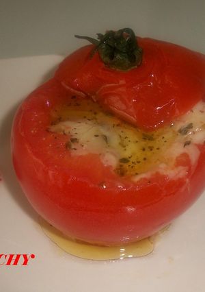 Una foto de Tomates gratinados con queso de cabra