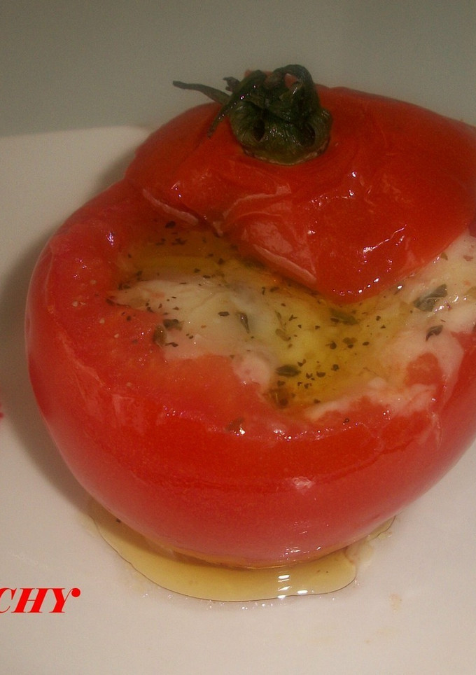 Una foto de Tomates gratinados con queso de cabra