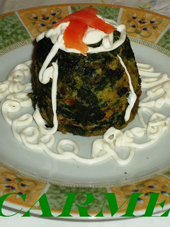 Una foto de Timbal de espinacas y champiñones en microondas