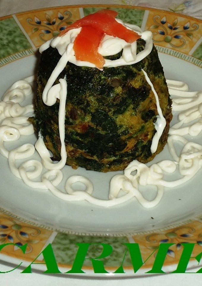 Una foto de Timbal de espinacas y champiñones en microondas