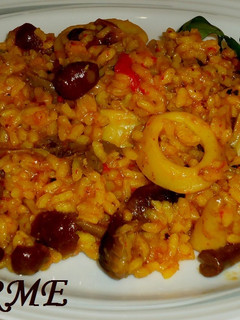 Una foto de Arroz de setas y calamares