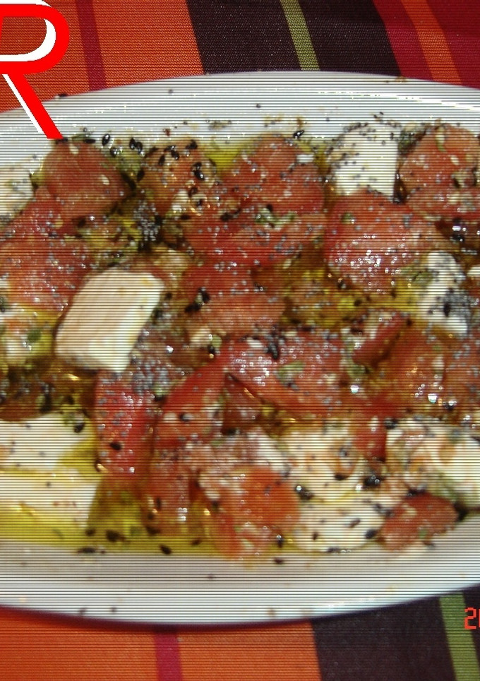 Una foto de Ensalada de queso y tomate