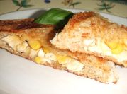 Una foto de sandwich de pollo cheddar