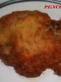 Filetes de cerdo adobados empanados