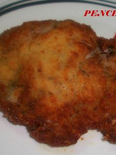 Una foto de Filetes de cerdo adobados empanados