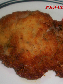 Una foto de Filetes de cerdo adobados empanados