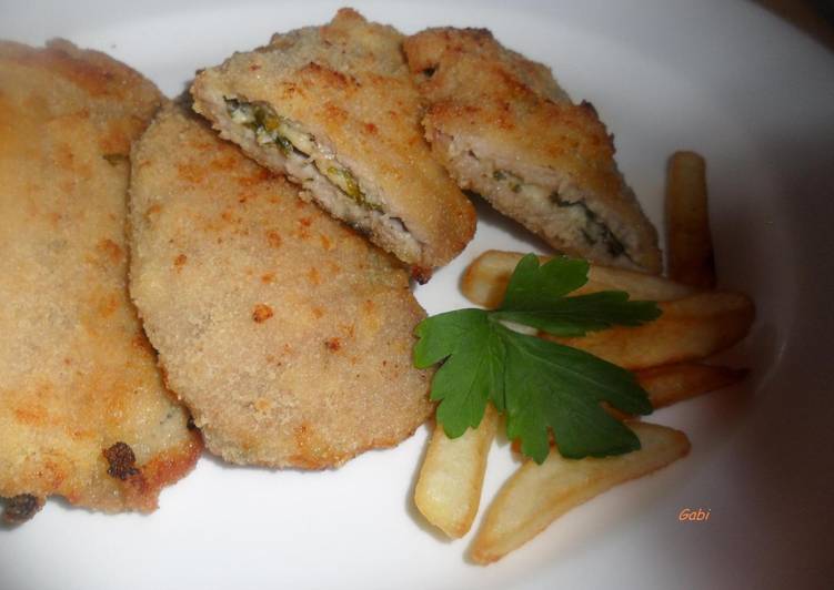 Filetes de lomo de cerdo rellenos de queso y perejil