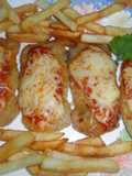 Filetes de cerdo rebozados a la napolitana con patatas fritas
