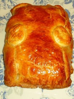Una foto de Napolitana de atún y aceitunas